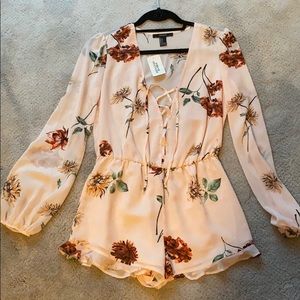 Pink floral long sleeve romper